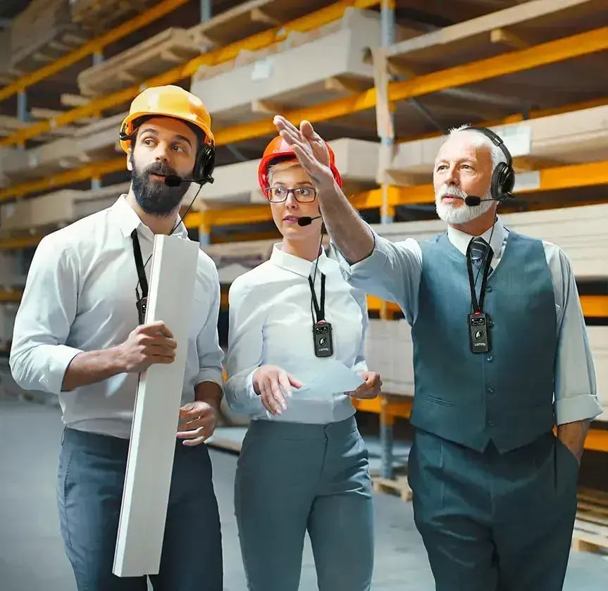 people-wearing-hardhats-and-headsets-on-factory-floor-v2