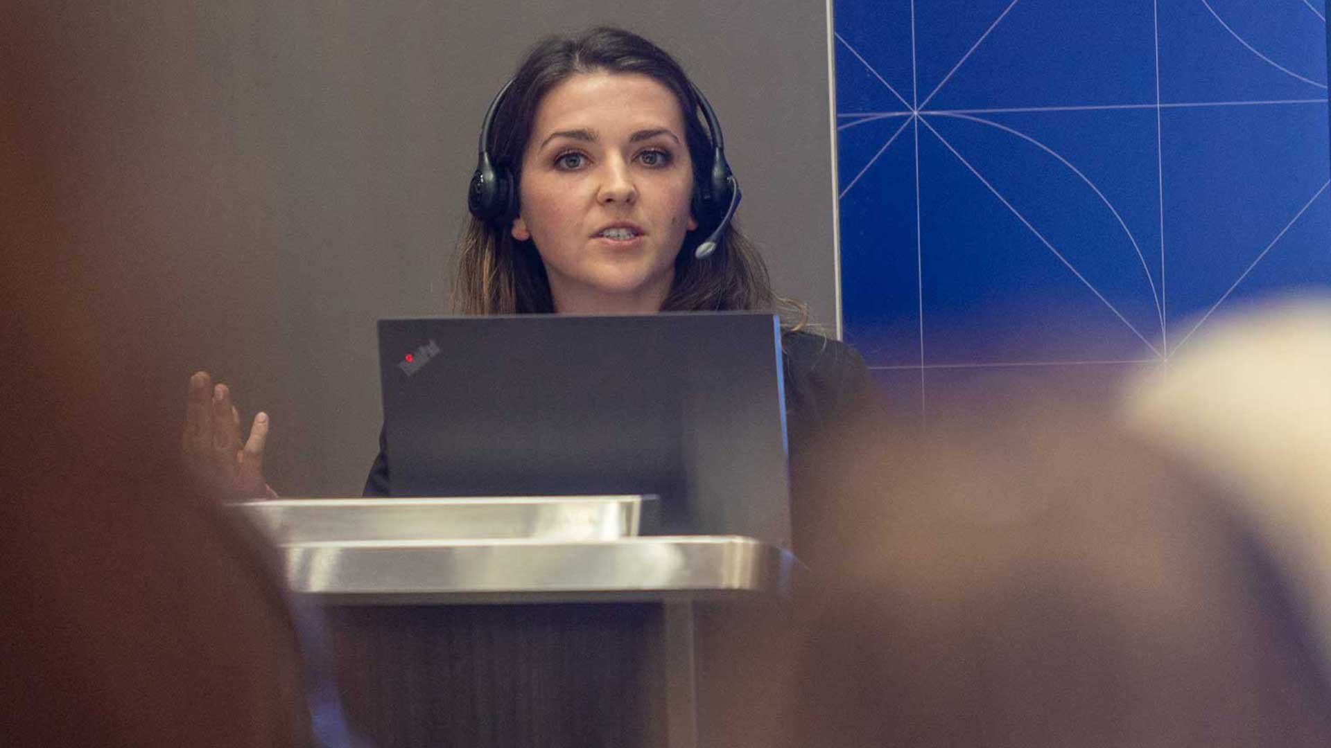 speaker-at-event-with-headset
